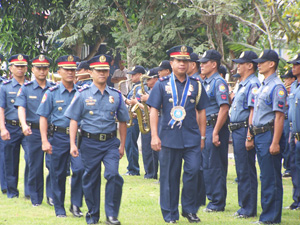 Outgoing Police Regional Office (PRO) 6 director Chief Supt. Wilfredo Dulay Sr. makes a final troop inspection