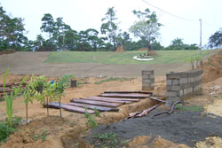 A mini golf course, also undergoing construction, is seen on the left side as one enters the resort.
