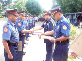 PRO 6 Director, PCSupt Isagani R. Cuevas awards PNP personnel who finished their Masters in Public Administration and Bachelor of Laws.