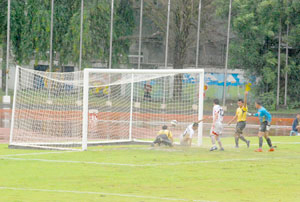 Brunei Darussalam's goalkeeper fails to stop a goal from the Philippines