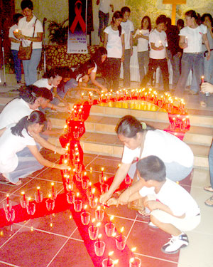 A candlelight memorial for those who died of AIDS.