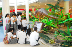 Students from the Philippine National Science High School take down notes at the exhibit.