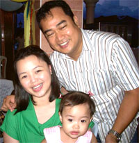 Talisay City  Mayor Dr Eric Saratan, with wife Sheila and baby.