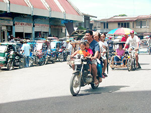 People in Calinog go on with their normal daily lives oblivious of the conflict engulfing the town leadership.