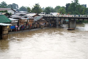 Residents living near the bank of Jaro river were on alert last Saturday and Sunday after the water level went up due to incessant heavy rains brought by typhoon Jolina.
