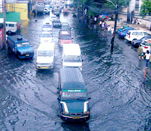 After almost seven months of dryness, the rain finally poured quite heavily yesterday morning causing a short-lived flood on a portion of Valeria Street, Iloilo City.