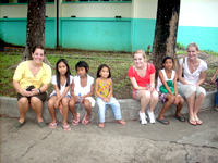 Alyssa and her fellow student nurses with village kids.