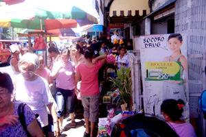 Pedestrians find a hard time negotiating the sidewalk along J.M. Basa St. in Iloilo City because of the presence of unregulated sidewalk vendors.