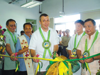 Ribbon cutting with DTI 6 Director Dominic Abad, Shane Townsend of US Wheat, Kenneth Uygongco and Rep. Jerry Trenas.