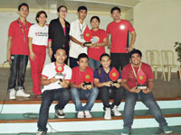 Seated are the representatives of each college that won in the Blood Olympics. Standing are the program host, Tess Estrella, assistant technical manager of the Department of Health’s Voluntary Blood Service Program; Dr. Judith Gimeno, manager of the Philippine National Red Cross’ WV Regional Blood Center; the champion in the Blood Olympics and Edgar Biñas, CPU Republic president.