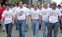 WALKING FORWARD. Iloilo City Mayor Jed Patrick Mabilog (2nd from left) with Councilors Plaridel Nava, Joshua Alim, Lyndon Acap, and Ely Estante lead the civic-military parade which culminated the city 's 73rd Charter day celebration yesterday.