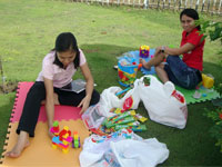 Camella staff preparing toys for kids.