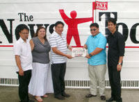 The News Today Publishing chairman Rosendo Mejica II (3rd from left) leads the symbolic hand-over of the newspaper to businessman Rommel Ynion (2nd from right), in the presence of   TNT  president  Christopher Montero (left)  and corporate secretary Marichel Magalona, and soon to be executive editor Junep Ocampo (right).