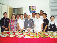 KCARSI Founder and President, Concepcion Carillo (2nd from left, front row) with some of the center’s students.