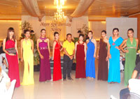 The celebrator  and the models wearing Mel Varca's gowns.