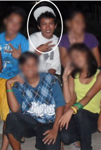 Photo shows at-large suspect Jeneil Boston (encircled) with friends.