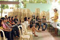 Project Manager Gibby Gorres from FTV Manila briefs the group of the roles and responsibilities of each member.